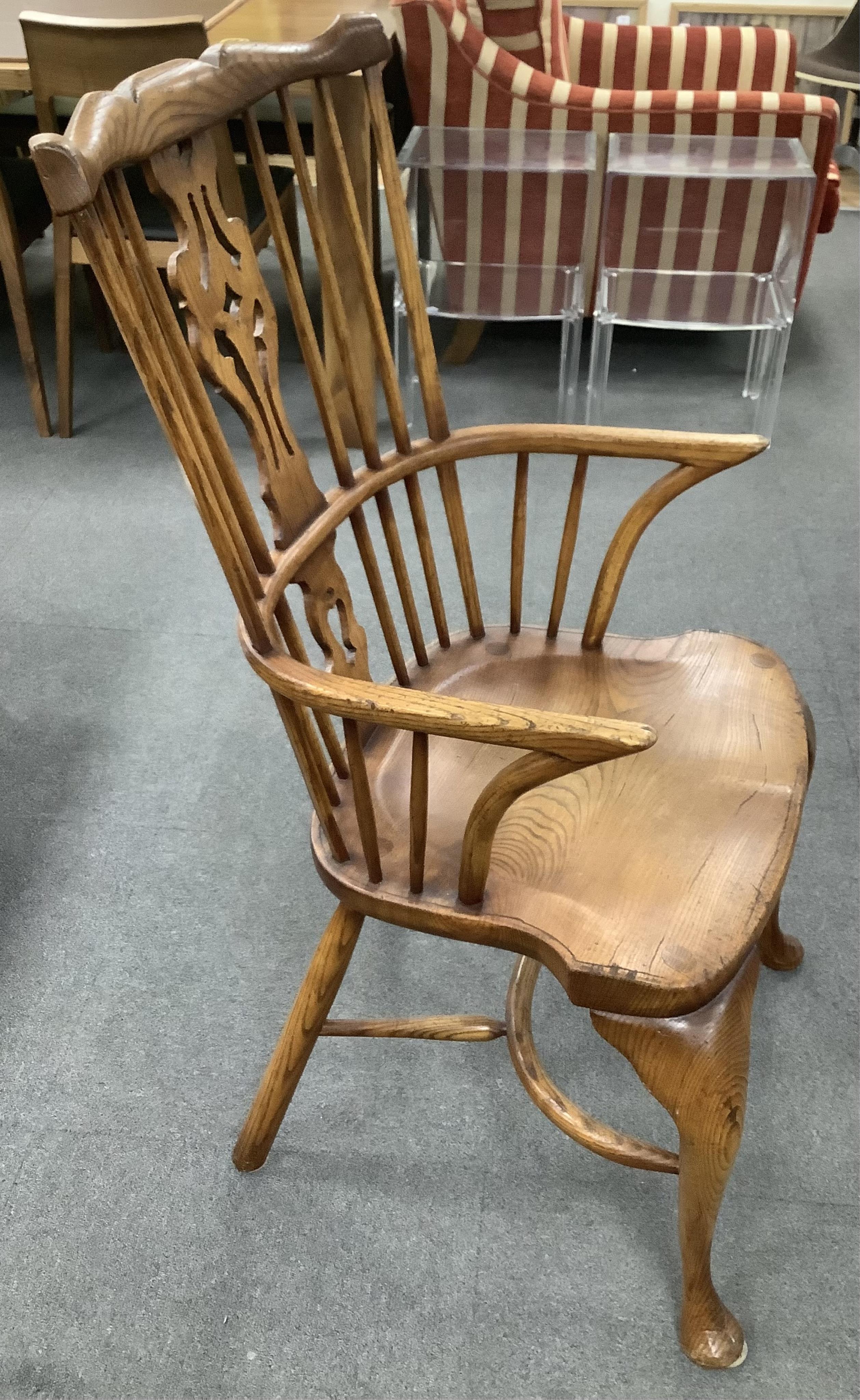 A set of six Titchmarsh & Goodwin elm Windsor chairs, two with arms. Condition - fair to good